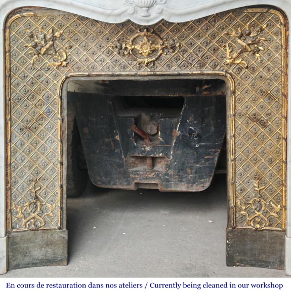 Louis XV style fireplace in Carrara marble, decorated with a vase of flowers-12