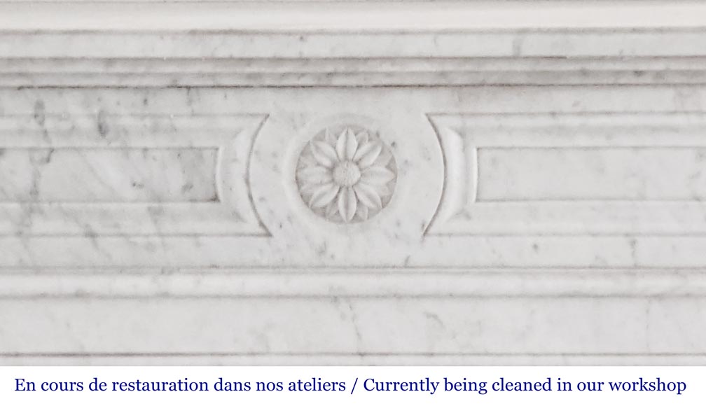 Louis XVI style fireplace with rounded corners and sunflower motif, in Carrara marble Louis XVI style fireplace with rounded corners and sunflower motif, in Carrara marble-1