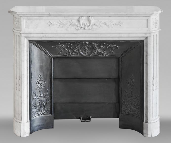 Louis XVI style fireplace with rounded corners and decorated with a laurel wreath, in Carrara marble-0
