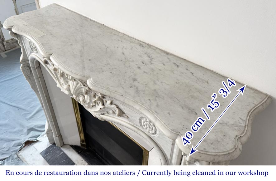 Louis XV style fireplace adorned with a large shell Louis XV style fireplace adorned with a large shell-12