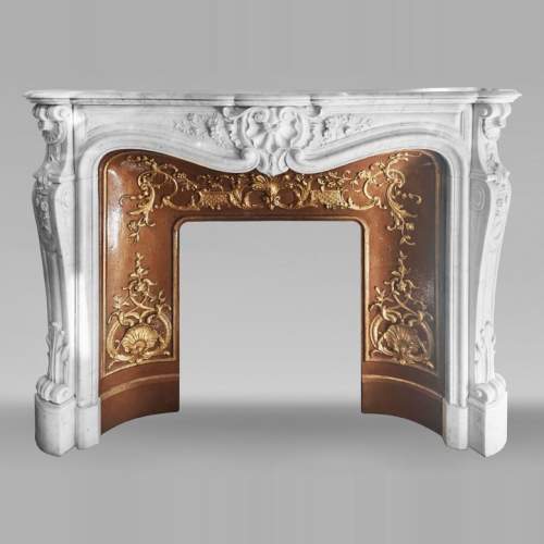 Louis XV style fireplace with floral decoration, in Carrara marble