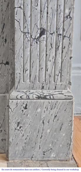  Louis XVI-style fireplace in blue fleuri marble, featuring fluted decoration-6