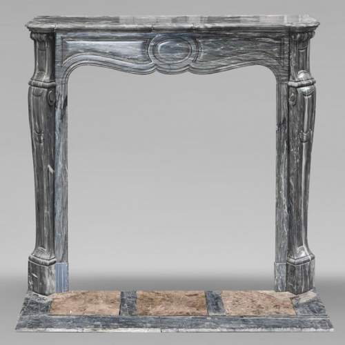 Louis XV style fireplace, Pompadour model, in Bleu Turquin marble