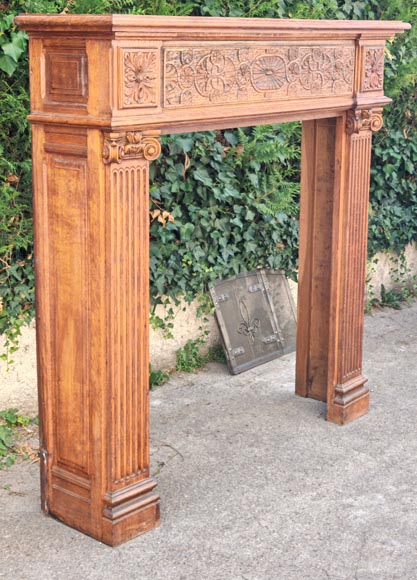Louis XVI style oak fireplace, decorated with an oak-leaf frieze and surmounted by its oak overmantel Louis XVI style oak fireplace, decorated with an oak-leaf frieze and surmounted by its oak overmantel-3