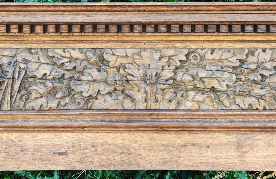 Louis XVI style oak fireplace, decorated with an oak-leaf frieze and surmounted by its oak overmantel Louis XVI style oak fireplace, decorated with an oak-leaf frieze and surmounted by its oak overmantel-13