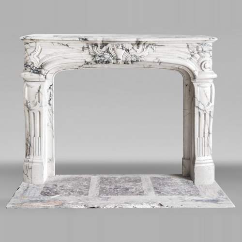 Regency-style Paonazzo marble fireplace with carved scrollwork