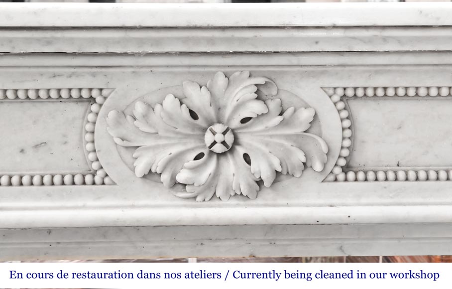 Carrara marble Louis XVI-style fireplace with bead-and-reel ornamentation Carrara marble Louis XVI-style fireplace with bead-and-reel ornamentation-1