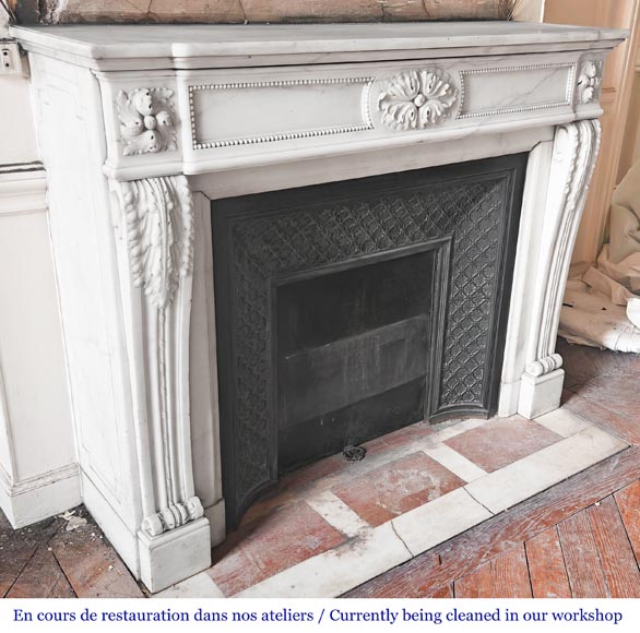Louis XVI-style statuary marble fireplace featuring acanthus leaf and bead-and-reel motifs Louis XVI-style statuary marble fireplace featuring acanthus leaf and bead-and-reel motifs-3