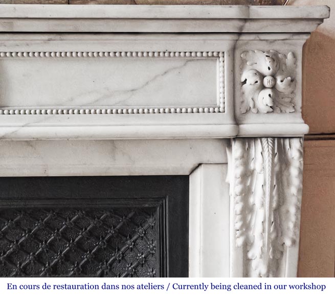 Louis XVI-style statuary marble fireplace featuring acanthus leaf and bead-and-reel motifs Louis XVI-style statuary marble fireplace featuring acanthus leaf and bead-and-reel motifs-8