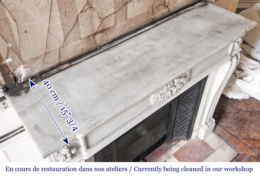 Louis XVI-style statuary marble fireplace featuring acanthus leaf and bead-and-reel motifs Louis XVI-style statuary marble fireplace featuring acanthus leaf and bead-and-reel motifs-11