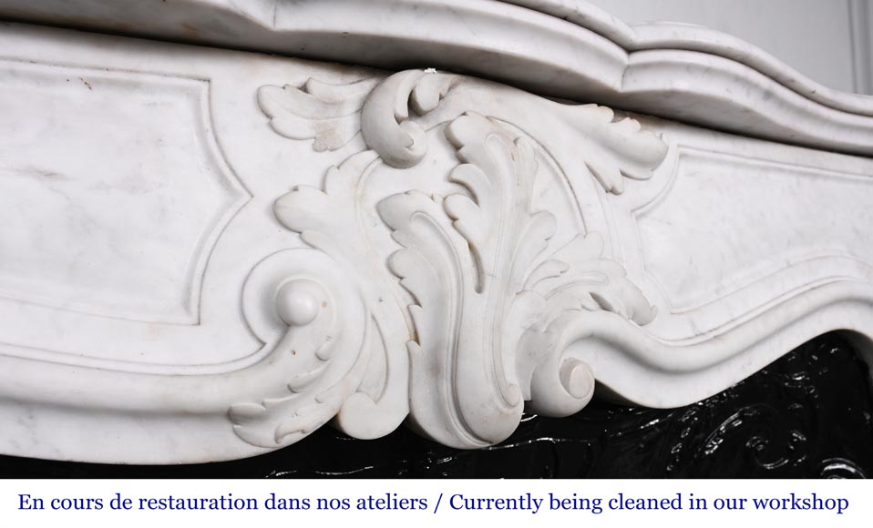 Louis XV-style fireplace in Carrara marble, featuring an asymmetrical palmette motif Louis XV-style fireplace in Carrara marble, featuring an asymmetrical palmette motif-2