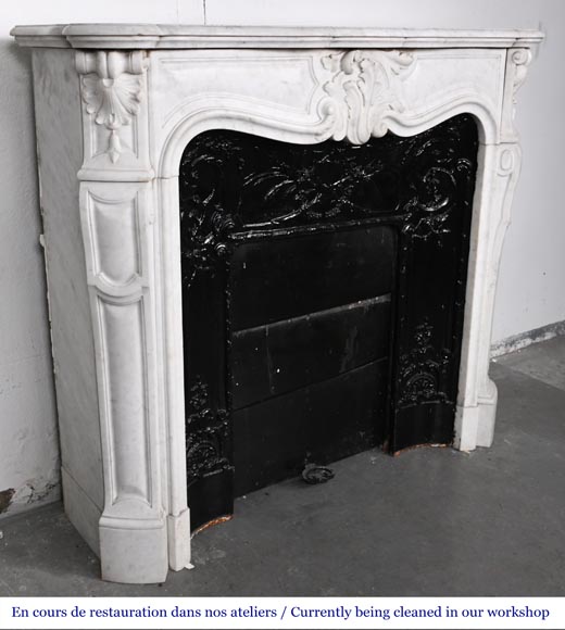 Louis XV-style fireplace in Carrara marble, featuring an asymmetrical palmette motif Louis XV-style fireplace in Carrara marble, featuring an asymmetrical palmette motif-4