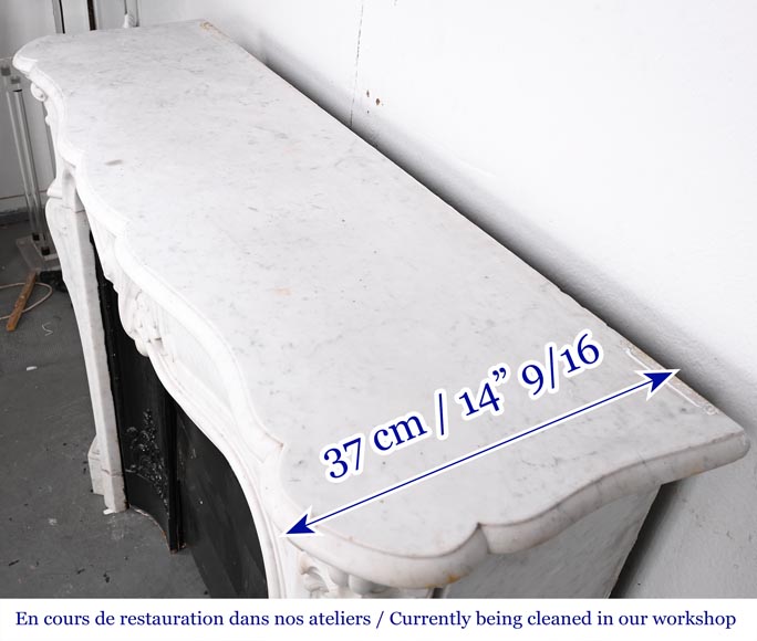 Louis XV-style fireplace in Carrara marble, featuring an asymmetrical palmette motif Louis XV-style fireplace in Carrara marble, featuring an asymmetrical palmette motif-14