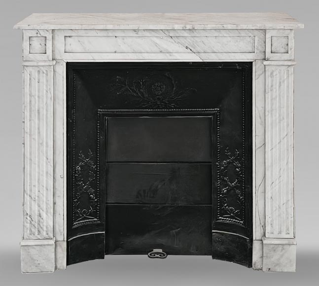 Louis XVI-style fireplace in Carrara marble, featuring molded ornamentation Louis XVI-style fireplace in Carrara marble, featuring molded ornamentation-0