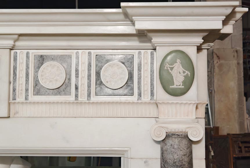 Victorian-style fireplace in statuary marble, featuring Ionic half-columns and a Wedgwood-style medallion decoration Victorian-style fireplace in statuary marble, featuring Ionic half-columns and a Wedgwood-style medallion decoration-12