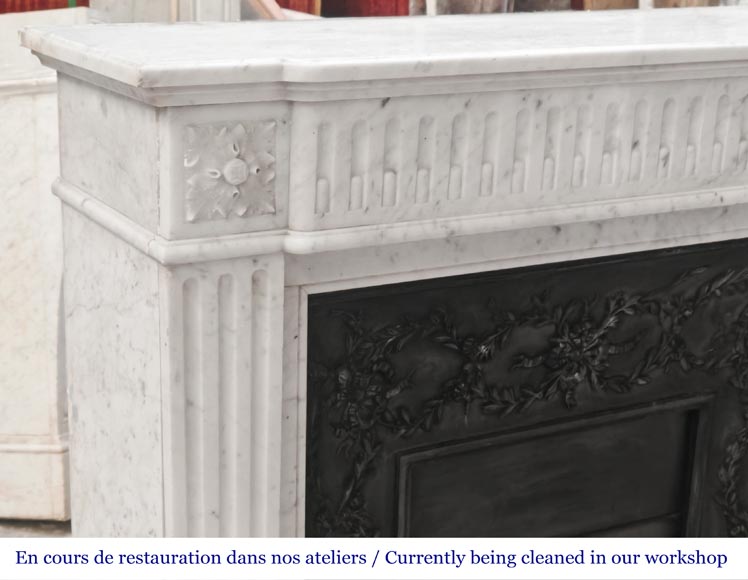 Louis XVI-style Carrara marble fireplace with a fluted frieze-3