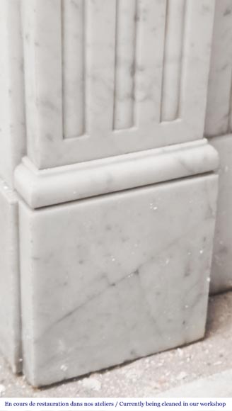 Louis XVI-style Carrara marble fireplace with a fluted frieze-4