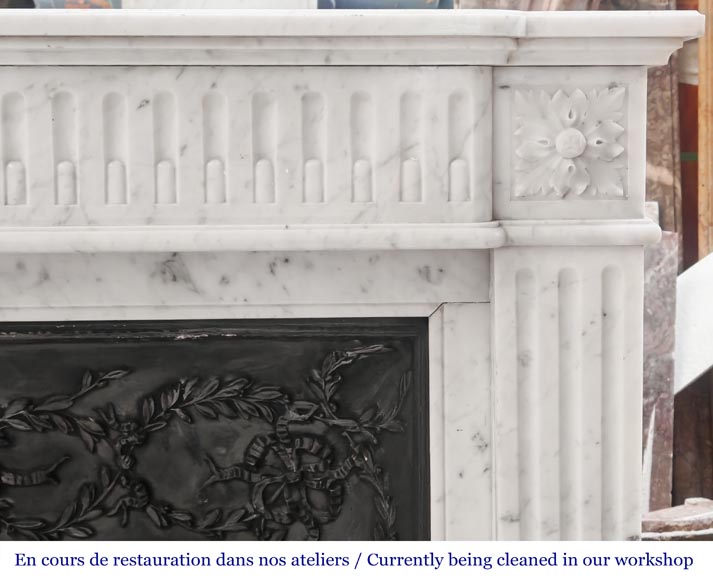 Louis XVI-style Carrara marble fireplace with a fluted frieze-6