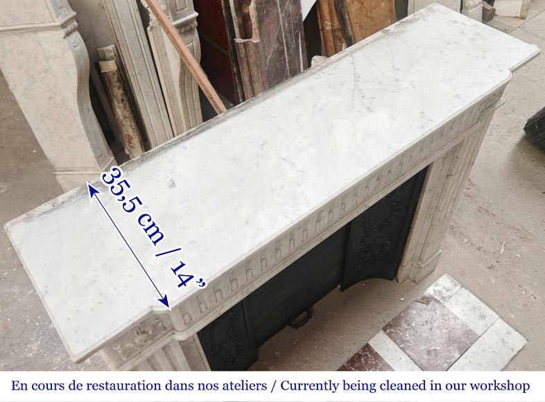 Louis XVI-style Carrara marble fireplace with a fluted frieze-10