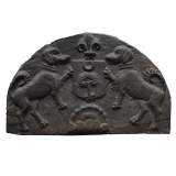 Antique cast iron fireback with dogs and coat of arms