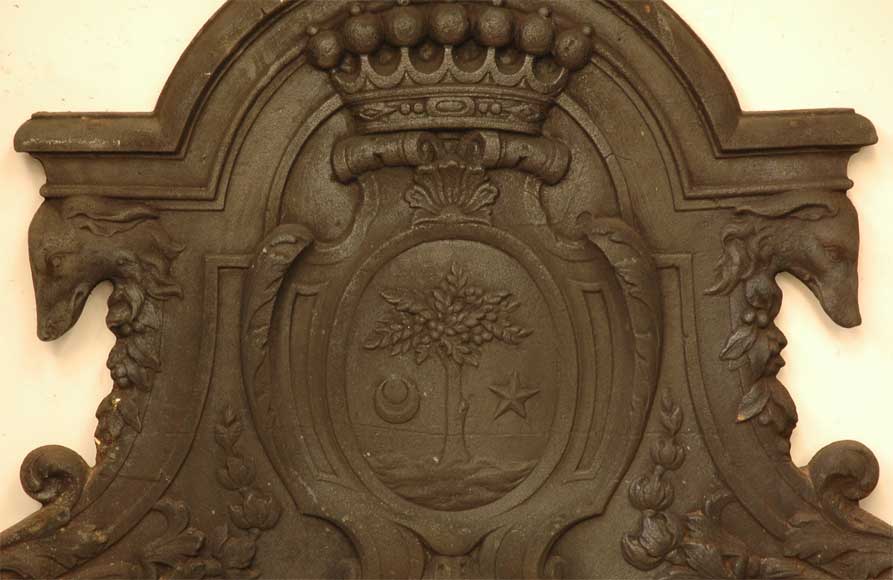 Antique cast iron fireback with the Le Juge family coat of arms and two dogs-1