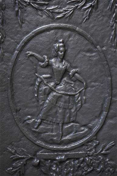 Antique cast iron fireback with a dancer-1