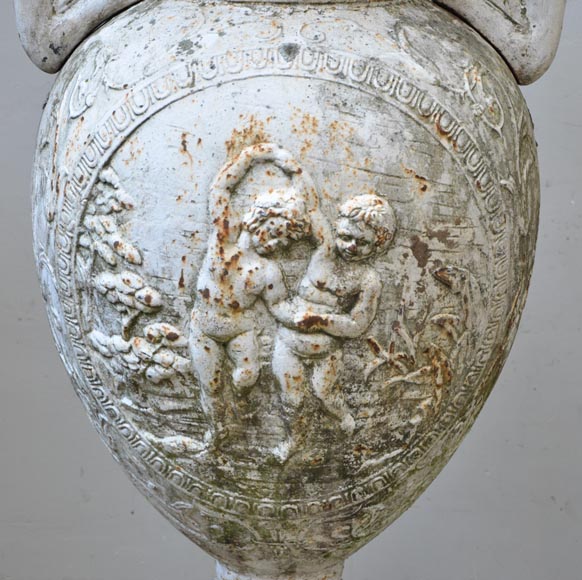 Antique pair of cast iron vases with putti-3