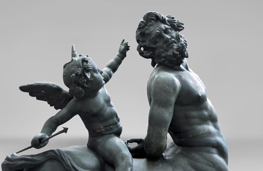  "Old centaur teased by Eros", antique garden statue in cast iron