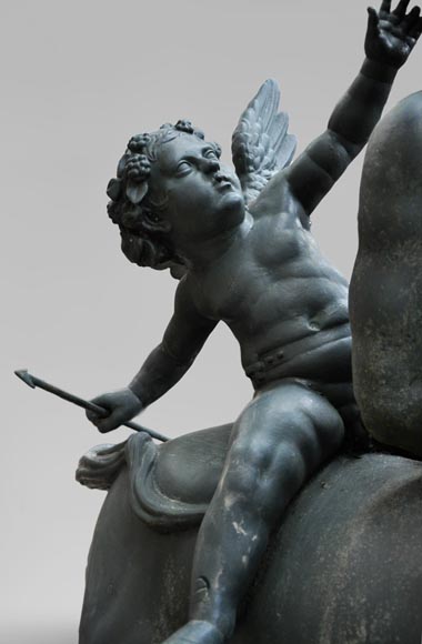  "Old centaur teased by Eros", antique garden statue in cast iron