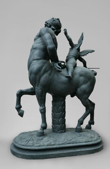  "Old centaur teased by Eros", antique garden statue in cast iron